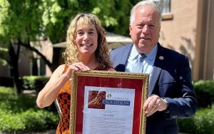 State Sen. Bill Dod, D-Napa, presents the Yolo County Woman of the Year Award to Joy Cohan, executive director of Yolo Meals on Wheels.