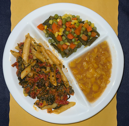 Vegetarian Tuscan pasta, mixed vegetables, spiced pears